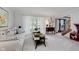 Inviting living room with a large window, neutral tones, and elegant decor at 1393 Stoney Creek Cir, Carmel, IN 46032
