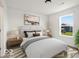 Cozy bedroom with a picture window that provides lots of natural light at 1456 Willow Tree Ln, Sheridan, IN 46069