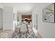 Bright dining room with modern table set and decor at 1456 Willow Tree Ln, Sheridan, IN 46069
