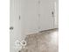 Bright entryway showcasing neutral-toned tile flooring and white doors at 1456 Willow Tree Ln, Sheridan, IN 46069