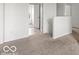 Upstairs hallway leading to the bedrooms at 1456 Willow Tree Ln, Sheridan, IN 46069