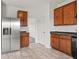 Spacious kitchen with wood cabinets, and stainless steel refrigerator at 1456 Willow Tree Ln, Sheridan, IN 46069