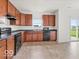 Well-equipped kitchen boasting ample cabinetry and modern appliances at 1456 Willow Tree Ln, Sheridan, IN 46069
