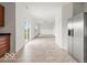 Modern kitchen with stainless steel refrigerator and easy access to the backyard through sliding doors at 1456 Willow Tree Ln, Sheridan, IN 46069