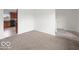 Open-concept living area with a seamless flow to the kitchen at 1456 Willow Tree Ln, Sheridan, IN 46069