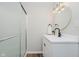 Bathroom boasting modern fixtures, a frameless shower, updated vanity and a decorative mirror at 1540 Roanoke Dr, Zionsville, IN 46077