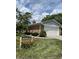 Charming home featuring a well-maintained lawn, flower beds, and a brick exterior with a two-car garage at 1540 Roanoke Dr, Zionsville, IN 46077
