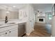 Kitchenette featuring updated appliances and a view into the living area at 1540 Roanoke Dr, Zionsville, IN 46077