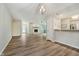 Open-concept space featuring a combined kitchen, living, and dining area with modern flooring at 1540 Roanoke Dr, Zionsville, IN 46077