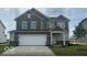 Charming two-story home featuring a two-car garage and neutral color palette at 16453 Mount Logan Rd, Noblesville, IN 46060