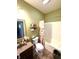 Cozy bathroom with a shower-tub, a vanity, and a toilet at 1688 Magnolia Dr, Greenwood, IN 46143