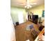 A cozy bedroom features carpet floors, a ceiling fan, a television, and a closet with outerwear at 1688 Magnolia Dr, Greenwood, IN 46143