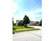 Attractive exterior view of home featuring well-kept lawns, coordinated landscaping, and welcoming architecture at 1688 Magnolia Dr, Greenwood, IN 46143