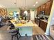 Modern kitchen with granite countertops, stainless steel appliances, and a breakfast bar at 1688 Magnolia Dr, Greenwood, IN 46143