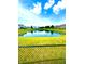 Scenic view of a neighborhood pond, perfect for enjoying nature at 1688 Magnolia Dr, Greenwood, IN 46143
