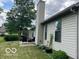 This home boasts an outdoor patio perfect for relaxing and entertaining with its lush green lawn at 17717 Cedarbrook Dr, Westfield, IN 46074