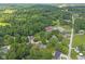 Aerial view showcasing the property's lush green surroundings and neighborhood at 1841 Shady Ln, Martinsville, IN 46151