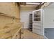 Basement featuring a pegboard wall, workbench, and gray door at 1841 Shady Ln, Martinsville, IN 46151