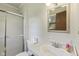 Cozy bathroom featuring a shower, toilet, and vanity at 1841 Shady Ln, Martinsville, IN 46151