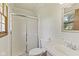 Cozy bathroom featuring a shower, toilet, and vanity at 1841 Shady Ln, Martinsville, IN 46151
