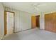 Bedroom with ensuite access, closet, and ceiling fan at 1841 Shady Ln, Martinsville, IN 46151