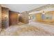 Open living area showing seamless access to kitchen and entry hall at 1841 Shady Ln, Martinsville, IN 46151