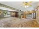 Open concept living room showcasing seamless flow to kitchen and front entry at 1841 Shady Ln, Martinsville, IN 46151