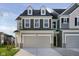 Two-story home features varied siding, dormer windows, and a two-car garage at 18811 Moray St, Westfield, IN 46074
