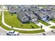 Aerial view of a house with a well-manicured lawn in a planned community at 19195 River Jordan Dr, Westfield, IN 46074