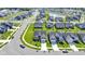 Community view of a neighborhood with manicured lawns, sidewalks, and a pond at 19195 River Jordan Dr, Westfield, IN 46074