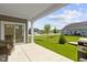 Outdoor patio area overlooks a well-manicured lawn and provides backyard views at 19195 River Jordan Dr, Westfield, IN 46074