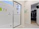 Bathroom offers a modern shower with glass door and convenient access to walk-in closet at 19195 River Jordan Dr, Westfield, IN 46074