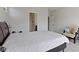Bright bedroom features a comfortable king bed, neutral walls, and a sunny ambiance at 19195 River Jordan Dr, Westfield, IN 46074