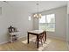 Bright dining area featuring natural light, chandelier, and light hardwood flooring at 19195 River Jordan Dr, Westfield, IN 46074