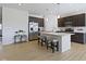 Bright kitchen featuring hardwood floors, stainless steel appliances, and an island with seating at 19195 River Jordan Dr, Westfield, IN 46074
