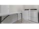 Bright laundry room featuring modern appliances, convenient folding table, and neutral color palette at 19195 River Jordan Dr, Westfield, IN 46074