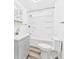 Bathroom with gray vanity and shower-tub combination at 203 Plum E St, Frankton, IN 46044