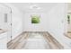 Bright dining room featuring modern flooring and natural light at 203 Plum E St, Frankton, IN 46044
