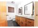Charming bathroom features a double sink vanity, updated fixtures, and great natural light at 207 E Waterbury Rd, Indianapolis, IN 46227