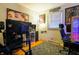 Bedroom showcasing unique artwork and ample lighting at 207 E Waterbury Rd, Indianapolis, IN 46227