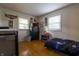 Bright bedroom featuring hardwood floors and decor at 207 E Waterbury Rd, Indianapolis, IN 46227