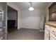 Eat-in kitchen nook features tile floors, lots of light and stainless steel refrigerator at 207 E Waterbury Rd, Indianapolis, IN 46227
