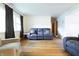 Spacious living room featuring beautiful hardwood floors and neutral-toned walls at 207 E Waterbury Rd, Indianapolis, IN 46227