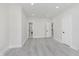 Large bedroom with open doorways to the bathroom and closet space showcasing a functional layout at 2125 N Pasadena St, Indianapolis, IN 46219