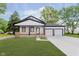 Charming home featuring fresh exterior paint and a spacious two-car garage at 2125 N Pasadena St, Indianapolis, IN 46219