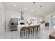 A sleek modern kitchen features stainless steel appliances and a large island at 2125 N Pasadena St, Indianapolis, IN 46219