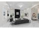 An inviting living room featuring a modern fireplace and recessed lighting at 2125 N Pasadena St, Indianapolis, IN 46219