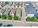 Aerial view of a modern residential area, featuring neat rows of homes, lush trees, and convenient street parking at 214 Handley St, Indianapolis, IN 46222