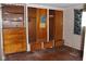 Bedroom area with an installed dresser and closet space at 220 S 2Nd St, Summitville, IN 46070