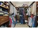 Walk-in closet with custom shelving, hanging rods, and drawers for optimal organization at 2246 Heather Glen Way, Franklin, IN 46131